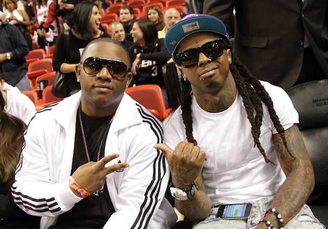 MIAMI, FL - DECEMBER 13: Mack Maine and Lil Wayne attend the Miami Heat vs New Orleans Hornets game at AmericanAirlines Arena on December 13, 2010 in Miami, Florida. (Photo by Alexander Tamargo/Getty Images)