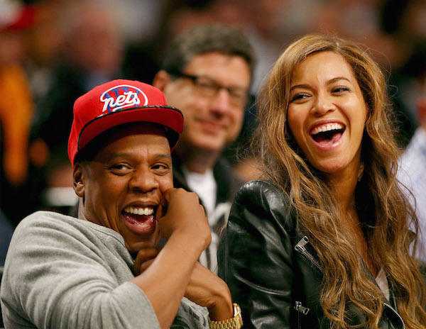 NEW YORK, NY - MAY 02: Beyonce and Jay-Z attend Game Six of the Eastern Conference Quarterfinals during the 2014 NBA Playoffs at the Barclays Center on May 2, 2014 in the Brooklyn borough of New York City. NOTE TO USER: The Brooklyn Nets defeated the Toronto Raptors 97-83. User expressly acknowledges and agrees that, by downloading and/or using this photograph, user is consenting to the terms and conditions of the Getty Images License Agreement. (Photo by Elsa/Getty Images)