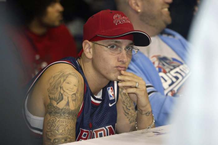 AUBURN HILLS, MI - JUNE 10: Rapper Eminem attends game three of the 2004 NBA Finals between the Detroit Pistons and the Los Angeles Lakers June 10, 2004 at the Palace of Auburn Hills, in Auburn Hills, Michigan. NOTE TO USER: User expressly acknowledges and agrees that, by downloading and/or using this Photograph, User is consenting to the terms and conditions of the Getty Images License Agreement. (Photo by Gregory Shamus/NBAE via Getty Images)