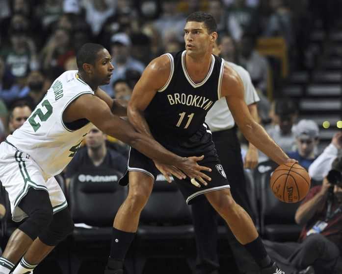 Oct 17, 2016; Boston, MA, USA; Brooklyn Nets center Brook Lopez (11) controls the ball as Boston Celtics center Al Horford (42) defends during the first half at TD Garden. Mandatory Credit: Bob DeChiara-USA TODAY Sports