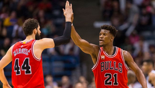 Apr 3, 2016; Milwaukee, WI, USA; Chicago Bulls guard Jimmy Butler (21) celebrates with forward Nikola Mirotic (44) during the fourth quarter against the Milwaukee Bucks at BMO Harris Bradley Center. Chicago won 102-98. Mandatory Credit: Jeff Hanisch-USA TODAY Sports