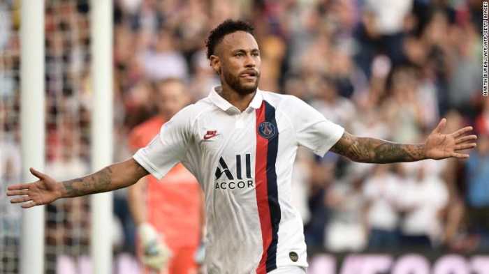 Paris Saint-Germain's Brazilian forward Neymar celebrates after scoring a goal during the French L1 football match between Paris Saint-Germain (PSG) and Racing Club de Strasbourg Alsace (RCS) on September 14, 2019 at the Parc des Princes stadium in Paris. (Photo by Martin BUREAU / AFP)MARTIN BUREAU/AFP/Getty Images