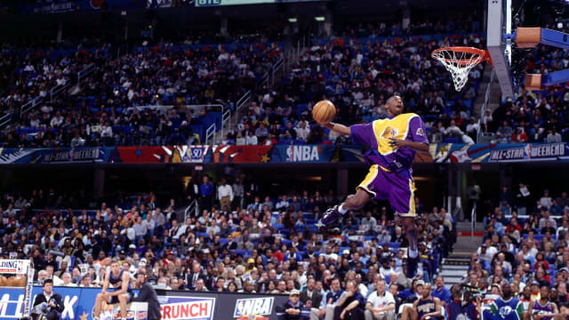 CLEVELAND - FEBRUARY 8: Kobe Bryant #8 of the Los Angeles Lakers goes up for one of his slam dunks that won first place in the NBA All-Star Slam Dunk Contest at Gund Arena on February 8, 1997 in Cleveland, Ohio. NOTE TO USER: User expressly acknowledges and agrees that, by downloading and or using this photograph, User is consenting to the terms and conditions of the Getty Images License Agreement. Mandatory copyright notice: Copyright NBAE 2002 (Photo by Andrew D. Bernstein/NBAE/Getty Images)