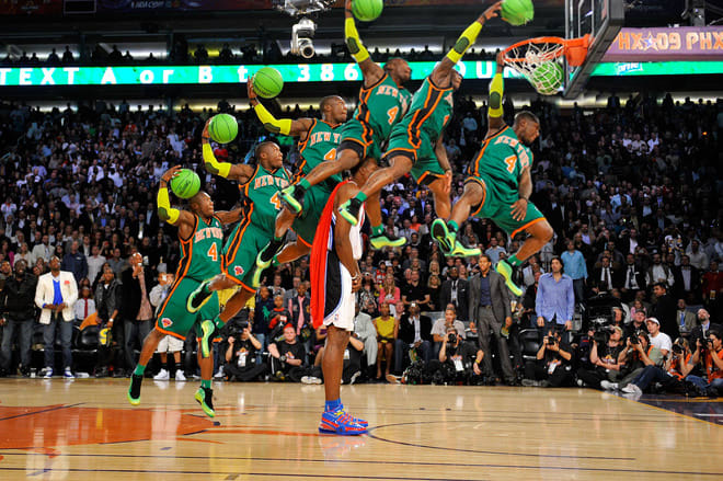 PHOENIX - FEBRUARY 14: (Sequence 1 of 6) Nate Robinson #4 of the New York Knicks jumps over Dwight Howard #12 of the Orlando Magic on a dunk attempt during the Sprite Slam Dunk Contest on All-Star Saturday Night, part of 2009 NBA All-Star Weekend at US Airways Center on February 14, 2009 in Phoenix, Arizona. NOTE TO USER: User expressly acknowledges and agrees that, by downloading and or using this photograph, User is consenting to the terms and conditions of the Getty Images License Agreement. Mandatory Copyright Notice: Copyright 2009 NBAE (Photo by Jesse D. Garrabrant/NBAE/Getty Images)