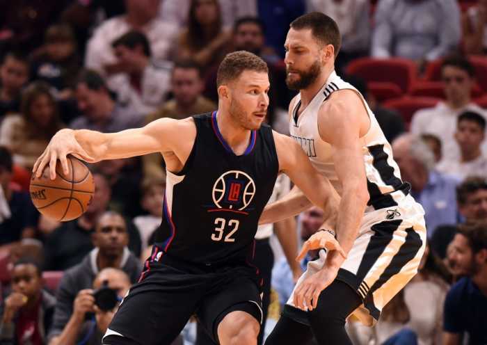 Dec 16, 2016; Miami, FL, USA; LA Clippers forward Blake Griffin (32) is pressured by Miami Heat forward Josh McRoberts (4) during the second half at American Airlines Arena. The Clippers won 102-98. Mandatory Credit: Steve Mitchell-USA TODAY Sports