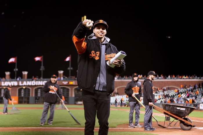Warriors Stephen Curry throws a baseball to a fan after the Atlanta Braves fell to the San Francisco Giants 4-2 at AT&T Park in San Francisco, Calif., on Friday, May 29, 2015.