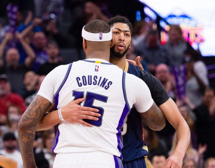 Feb 12, 2017; Sacramento, CA, USA; Sacramento Kings forward DeMarcus Cousins (15) and New Orleans Pelicans forward Anthony Davis (23) hug after the game at Golden 1 Center. The Sacramento Kings defeated the New Orleans Pelicans 105-99. Mandatory Credit: Kelley L Cox-USA TODAY Sports