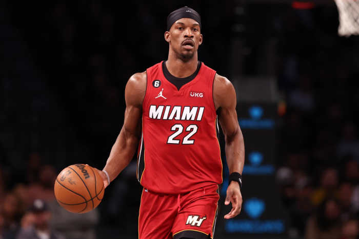 Feb 15, 2023; Brooklyn, New York, USA; Miami Heat forward Jimmy Butler (22) dribbles up court during the first half against the Brooklyn Nets at Barclays Center. Mandatory Credit: Vincent Carchietta-Imagn Images
