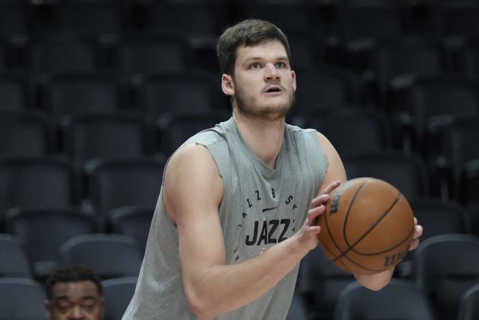 Utah Jazz center Walker Kessler (24) warms up before the game against the Portland Trail Blazers at Moda Center.