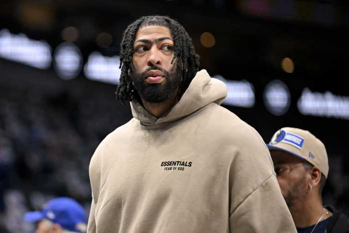 Dallas Mavericks forward Anthony Davis (3) watches team warm ups before the game between the Dallas Mavericks and the Detroit Pistons at the American Airlines Center. Mandatory Credit: Jerome Miron-Imagn Images