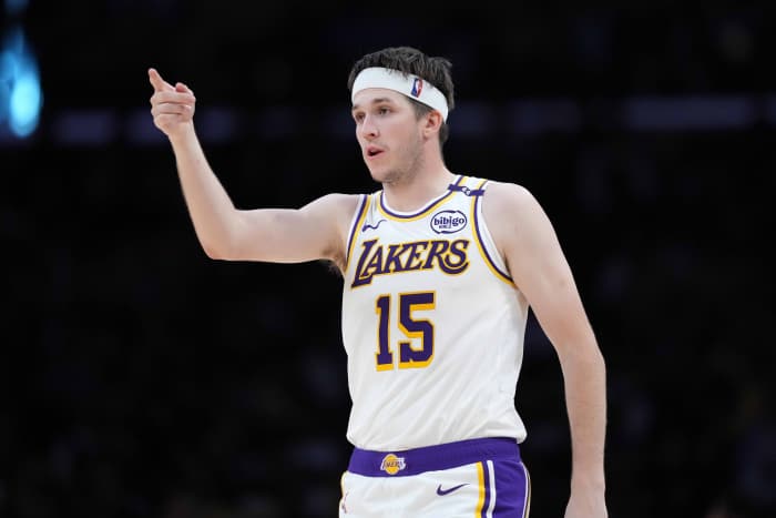 Los Angeles, California, USA; Los Angeles Lakers guard Austin Reaves (15) gestures against the Phoenix Suns in the second half at Crypto.com Arena. Mandatory Credit: Kirby Lee-Imagn Images