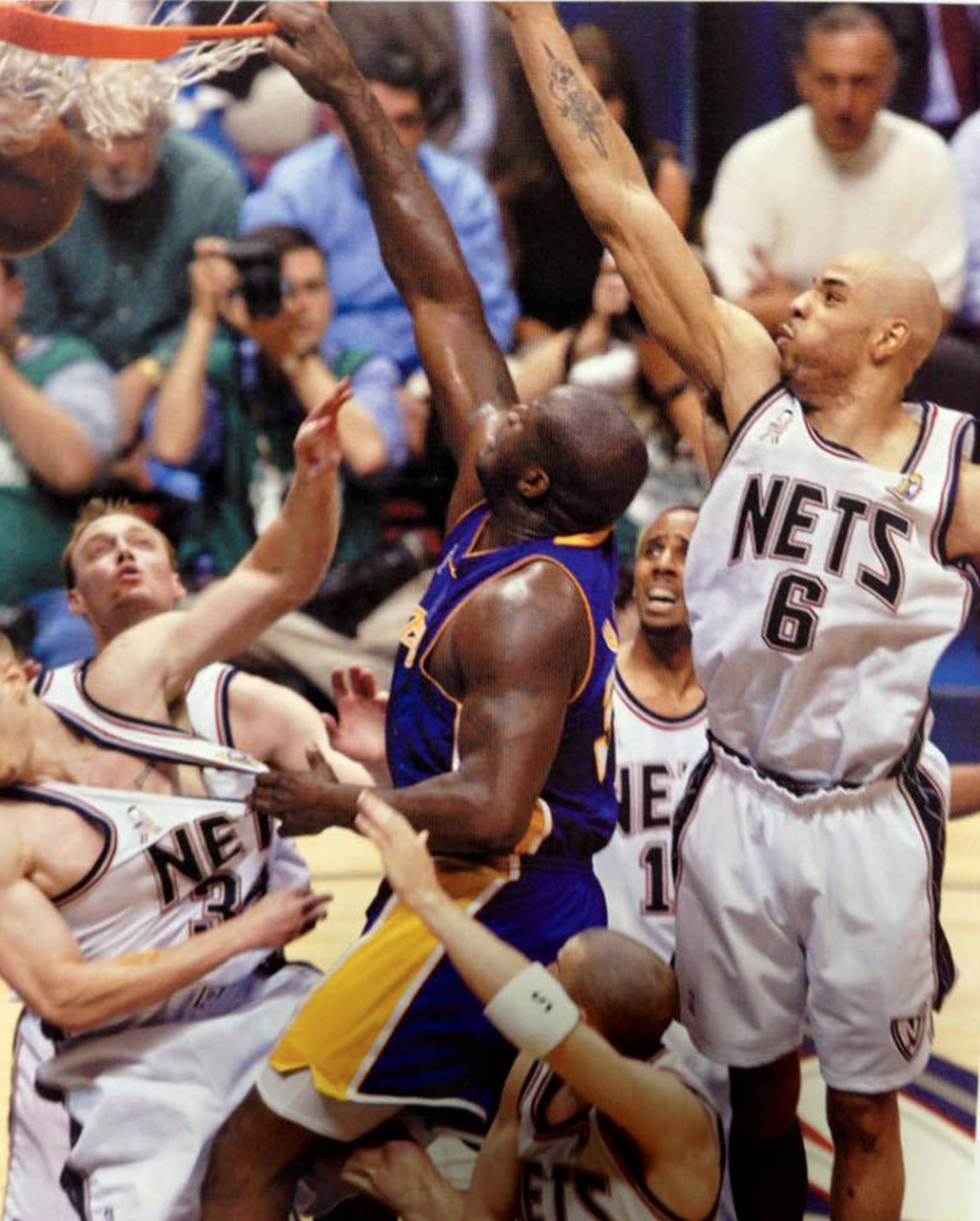 Shaquille O'Neal Dunks On Nets