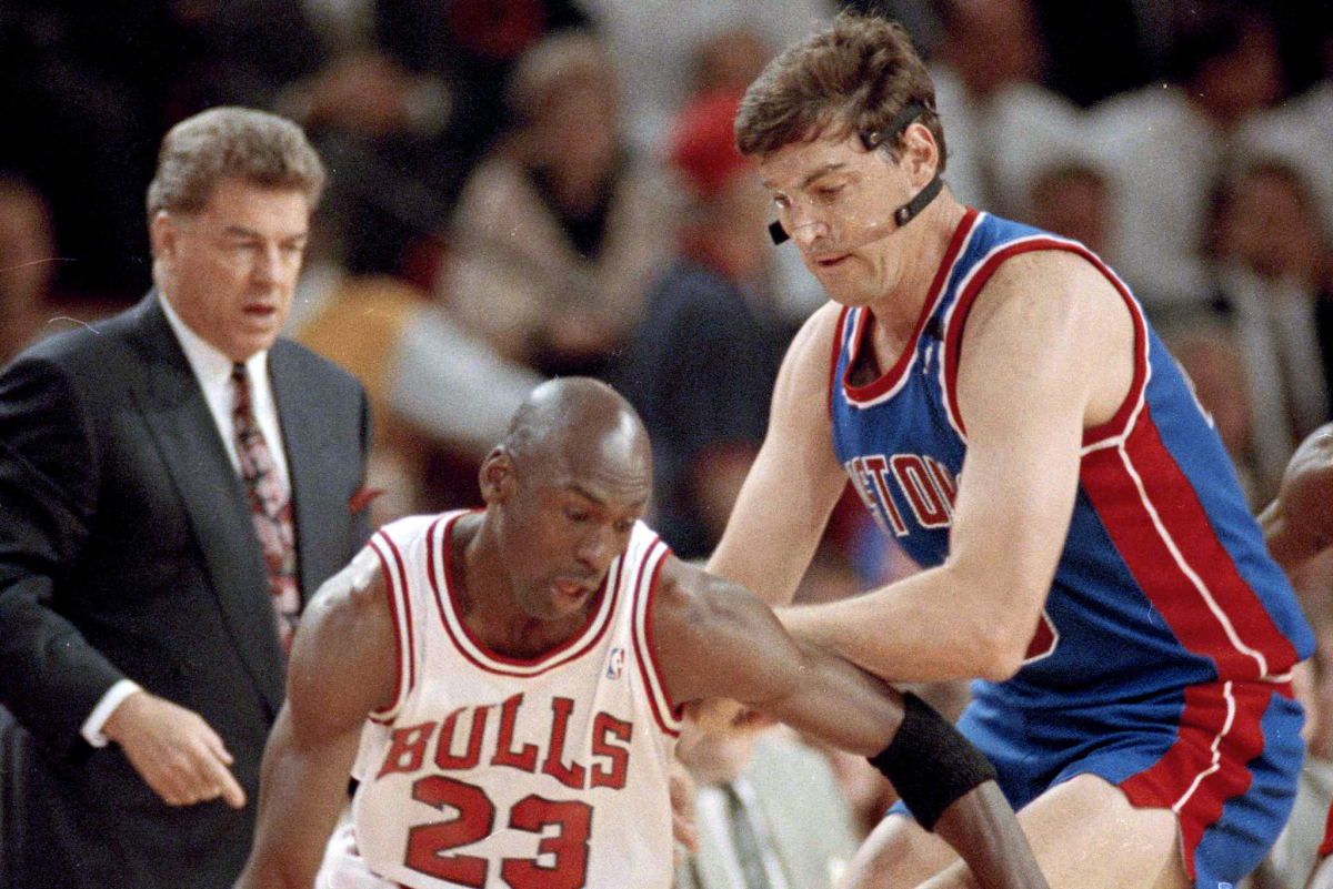 Video Surfaces Of Michael Jordan Throwing A Right Cross To Bill Laimbeer, Who Quickly Runs Away