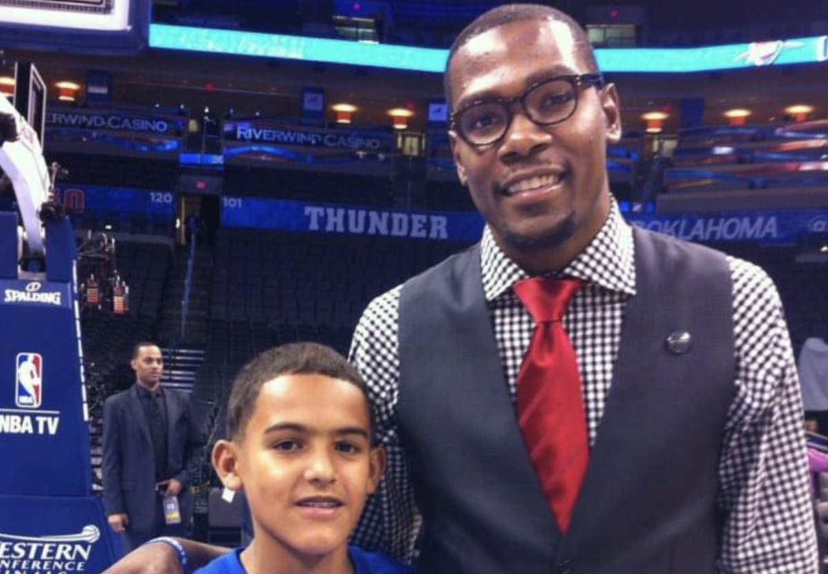 Trae Young’s Father Shares Iconic Picture From 10 Years Ago Of Trae Young And Kevin Durant Before Game 1 Of The 2012 NBA Finals: “I Asked Kendrick Perkins But He Big Timed Us.”