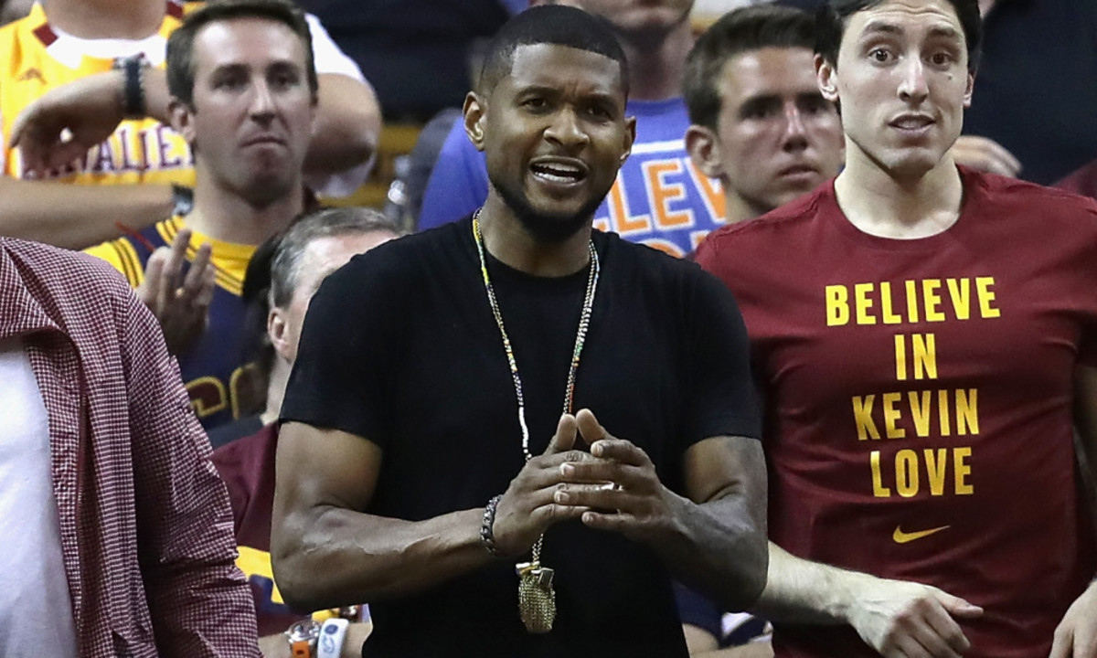 CLEVELAND, OH - JUNE 10:  Recording artist Usher attends Game 4 of the 2016 NBA Finals between the Golden State Warriors and the Cleveland Cavaliers at Quicken Loans Arena on June 10, 2016 in Cleveland, Ohio. NOTE TO USER: User expressly acknowledges and agrees that, by downloading and or using this photograph, User is consenting to the terms and conditions of the Getty Images License Agreement.  (Photo by Ronald Martinez/Getty Images) ORG XMIT: 643779587 ORIG FILE ID: 539322414