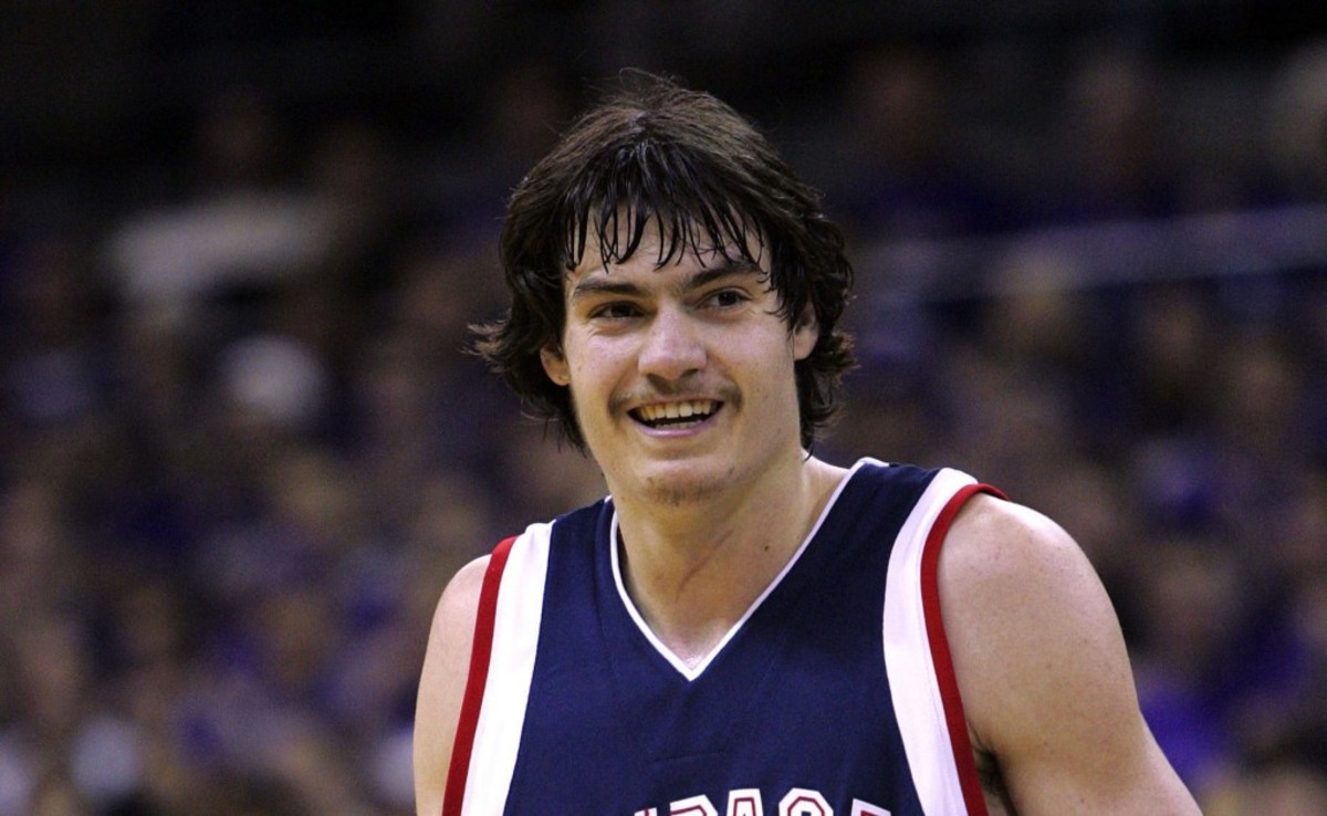** ADVANCE FOR WEEKEND EDITIONS DEC. 10-11 ** Gonzaga's Adam Morrison smiles briefly during a game against Washington, Sunday, Dec. 4, 2005, in Seattle. The first time Morrison touched the ball in a college basketball game, he dribbled the length of the floor and scored on Saint Joseph's in Madison Square Garden. The preseason All-America has been a big-time player ever since for No. 9 Gonzaga. He currently leads the nation with an average of 29.7 points per game. (AP Photo/Elaine Thompson)
