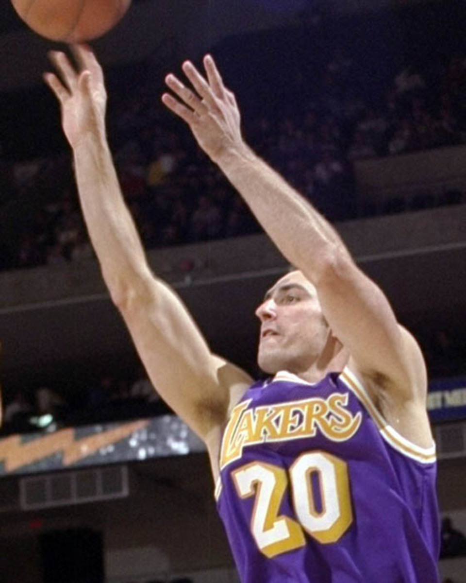 10 Dec 1997:  Guard Jon Barry of the Los Angeles Lakers shoots the ball during a game against the Golden State Warriors at the Oakland Coliseum in Oakland, California.  The Warriors won the game 93-92. Mandatory Credit: Todd Warshaw  /Allsport