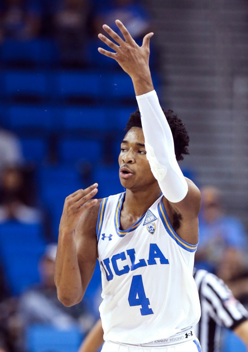 UCLA guard Jaylen Hands signals that he hit a 3-point shot during the second half of an NCAA college basketball game against South Carolina on Friday, Nov. 17, 2017, in Los Angeles. UCLA won 96-68. (AP Photo/Ringo H.W. Chiu)