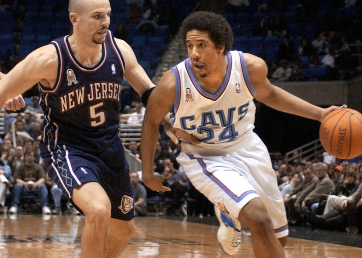 51703538-cleveland-cavaliers-guard-andre-miller-r-drives
