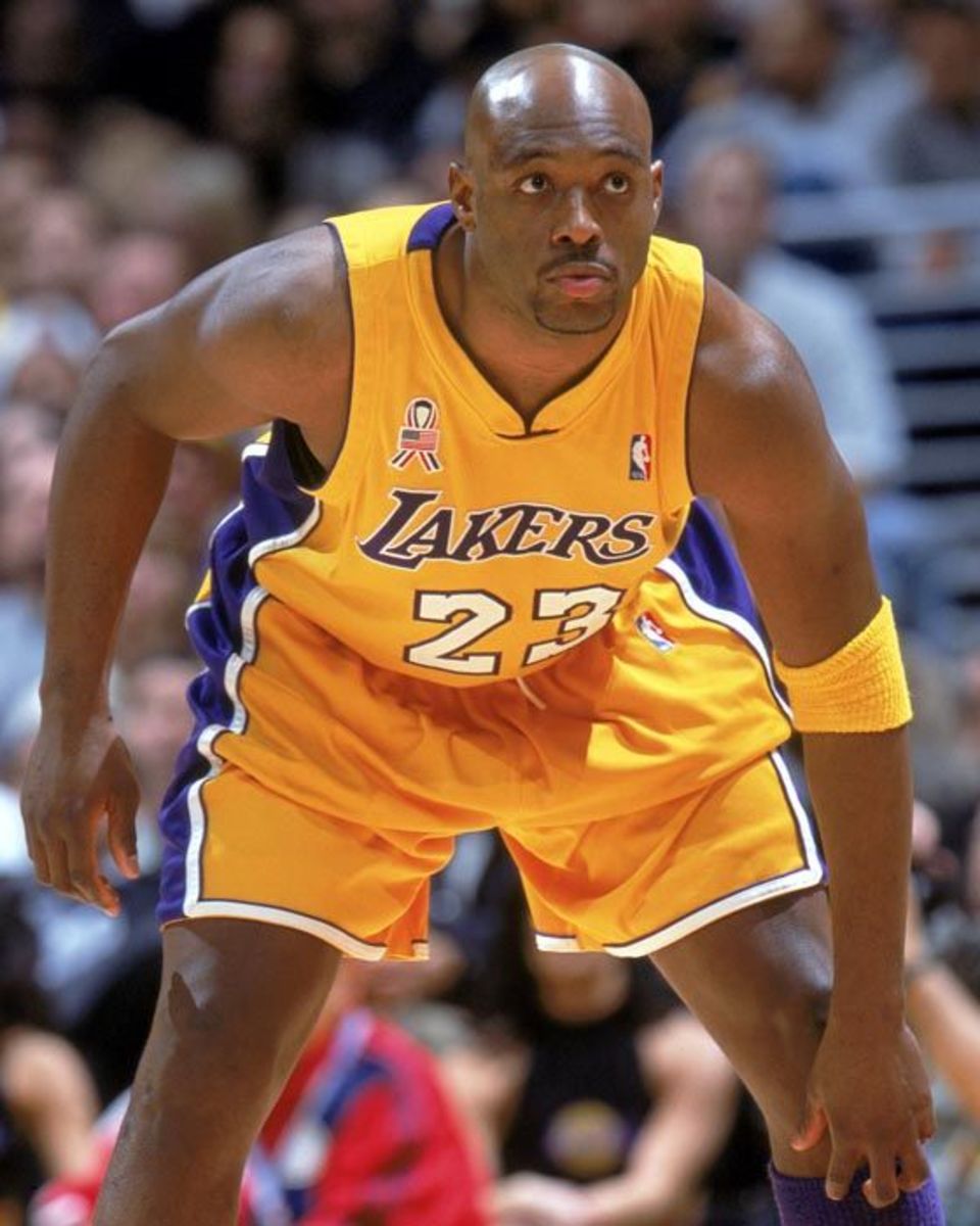 12 Feb 2002:  Guard Mitch Richmond #32 of the Los Angeles Lakers plays defense during the NBA game against the Washington Wizards at the Staples Center in Los Angeles, California.  The Lakers defeated the Wizards 103-94.  NOTE TO USER: User expressly acknowledges and agrees that, by downloading and/or using this Photograph, User is consenting to the terms and conditions of the Getty Images License Agreement. Mandatory copyright notice: Copyright 2002 NBAE Mandatory Credit: Andy Bernstein/NBAE/Getty Images