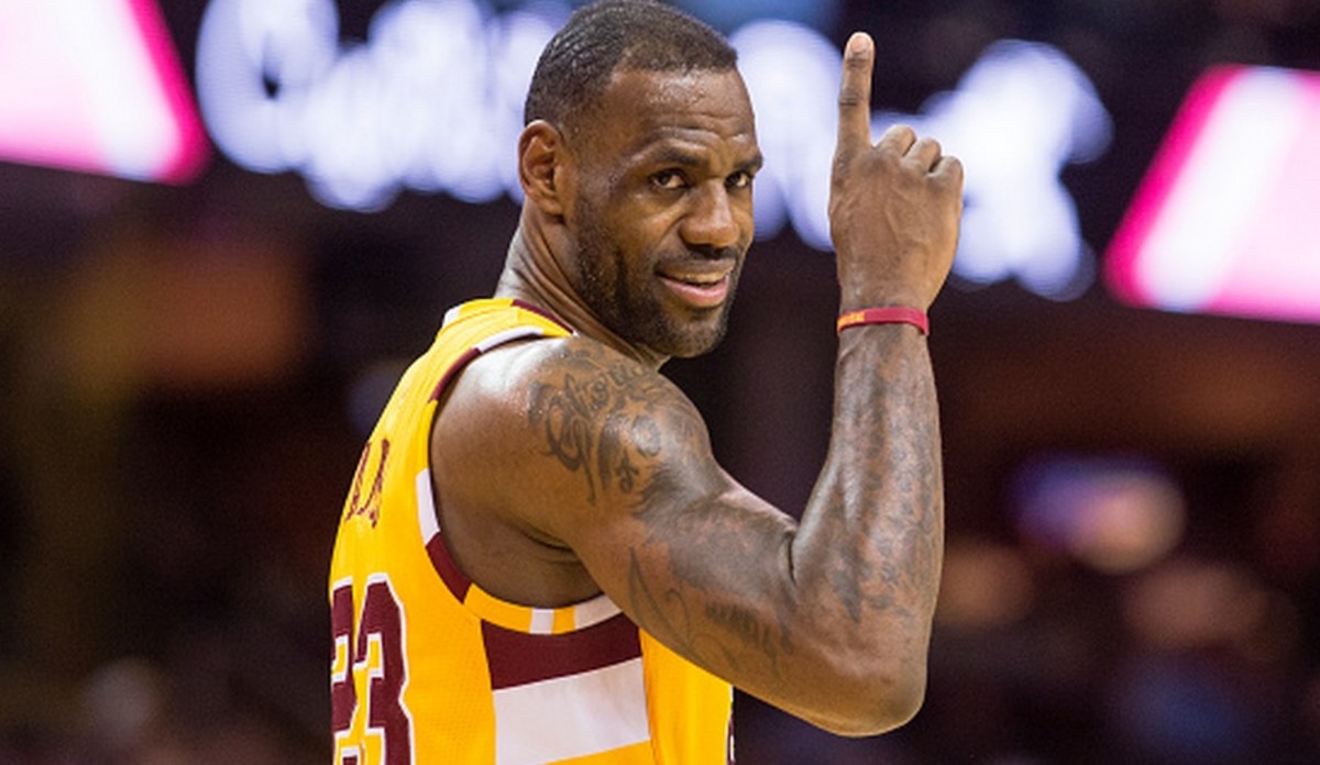 CLEVELAND, OH - FEBRUARY 10: LeBron James #23 of the Cleveland Cavaliers points to the scoreboard during the first half against the Los Angeles Lakers at Quicken Loans Arena on February 10, 2016 in Cleveland, Ohio. NOTE TO USER: User expressly acknowledges and agrees that, by downloading and/or using this photograph, user is consenting to the terms and conditions of the Getty Images License Agreement. Mandatory copyright notice. (Photo by Jason Miller/Getty Images)