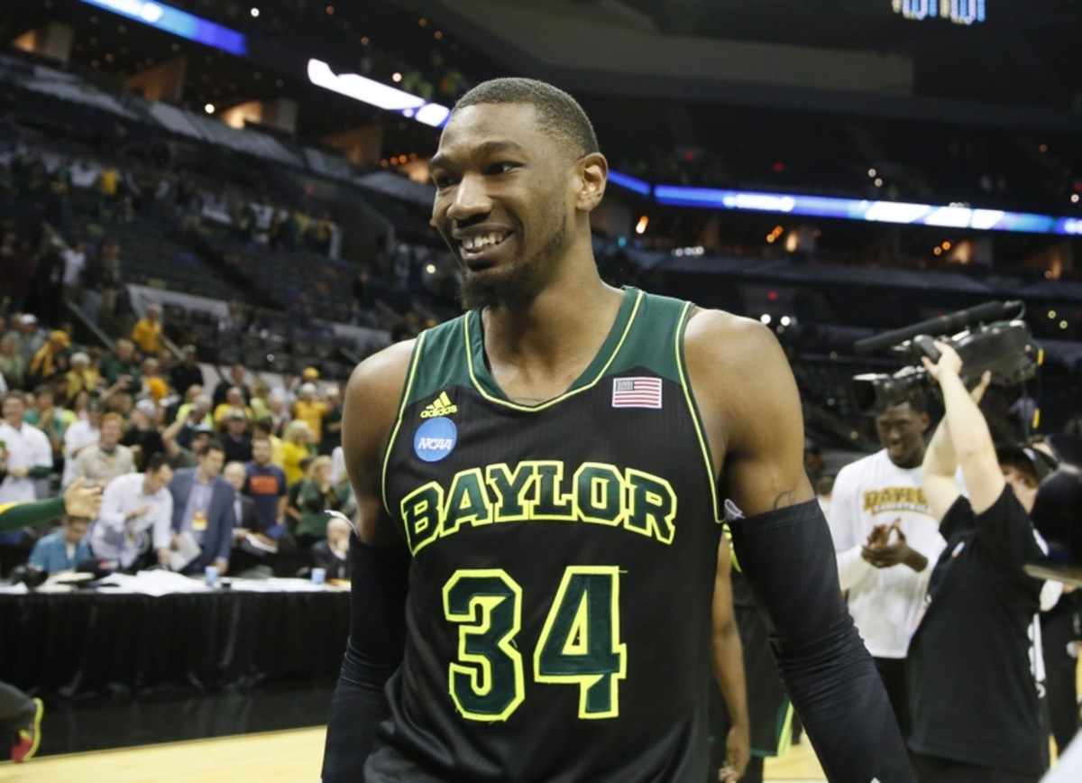 Mar 23, 2014; San Antonio, TX, USA; Baylor Bears forward Cory Jefferson (34) smiles as he walks off court after beating the Creighton Bluejays in a men's college basketball game during the third round of the 2014 NCAA Tournament at AT&amp;T Center. Mandatory Credit: Soobum Im-USA TODAY Sports