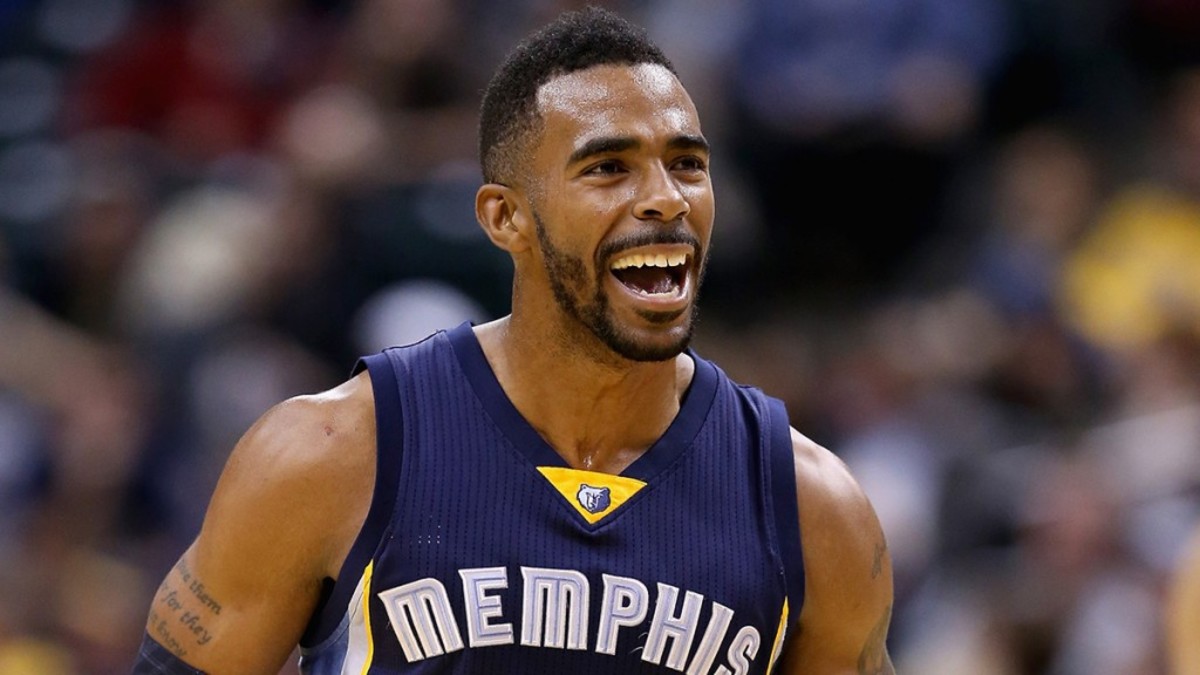 INDIANAPOLIS, IN - OCTOBER 31:  Mike Conley #11 of the Memphis Grizzlies celebrates  during the game against the Indiana Pacers at Bankers Life Fieldhouse on October 31, 2014 in Indianapolis, Indiana.NOTE TO USER: User expressly acknowledges and agrees that, by downloading and or using this Photograph, user is consenting to the terms and conditions of the Getty Images License Agreement. Mandatory Copyright Notice:  (Photo by Andy Lyons/Getty Images)