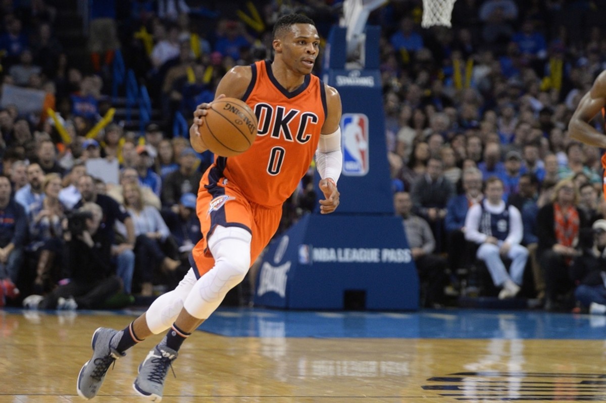 Jan 6, 2016; Oklahoma City, OK, USA;  Oklahoma City Thunder guard Russell Westbrook (0) dribbles the ball against the Memphis Grizzlies during the second quarter at Chesapeake Energy Arena. Mandatory Credit: Mark D. Smith-USA TODAY Sports