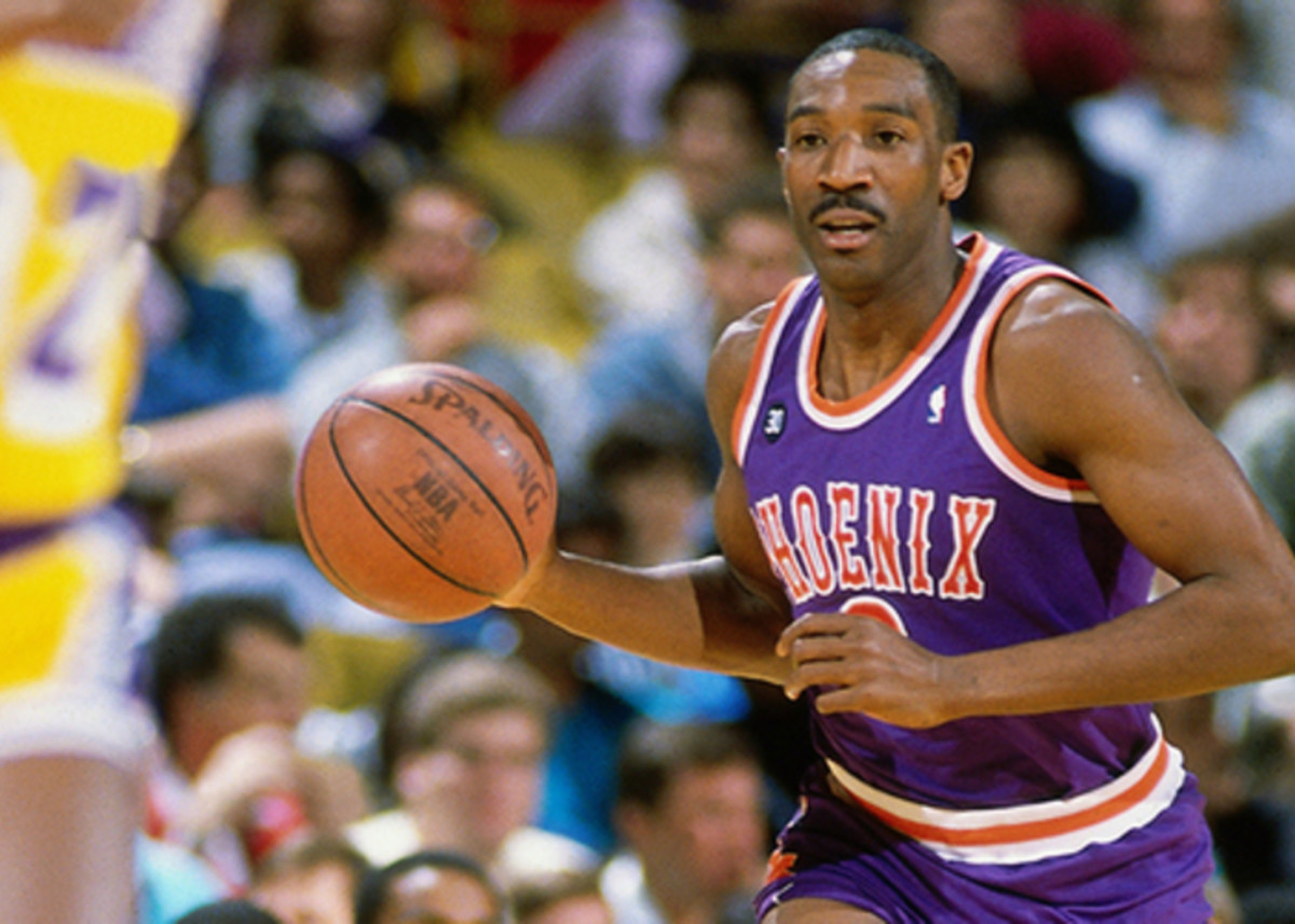 INGLEWOOD, CA - CIRCA 1987: Walter Davis of the Phoenix Suns dribbles against the Los Angeles Lakers circa 1987 at the Great Western Forum in Inglewood, California. NOTE TO USER: User expressly acknowledges and agrees that, by downloading and or using this photograph, User is consenting to the terms and conditions of the Getty Images License Agreement. Mandatory Copyright Notice: Copyright 1987 NBAE (Photo by Andrew D. Bernstein/NBAE via Getty Images)