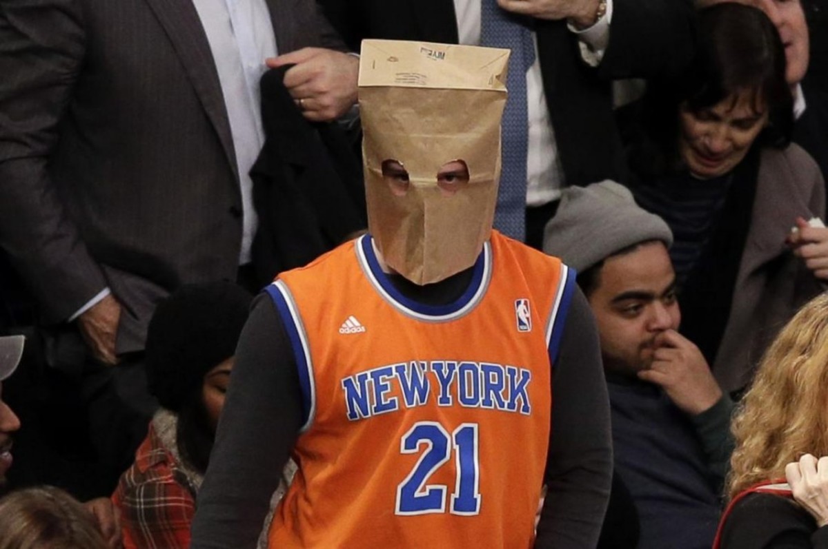 Photos-Fans-hide-faces-behind-paper-bags-as-hapless-Knicks-lose-14th-straight-game