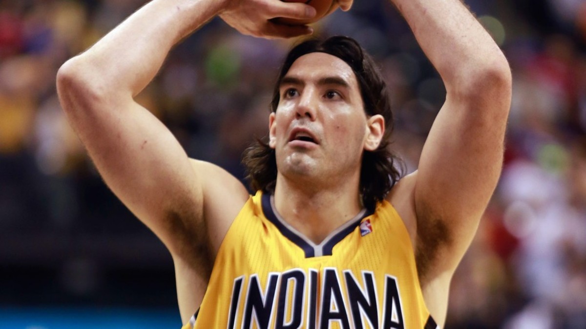 Indiana Pacers forward Luis Scola shoots a free throw against the Chicago Bulls in the second half of an NBA basketball game in Indianapolis, Friday, March 21, 2014. Indiana won 91-79.  (AP Photo/R Brent Smith)