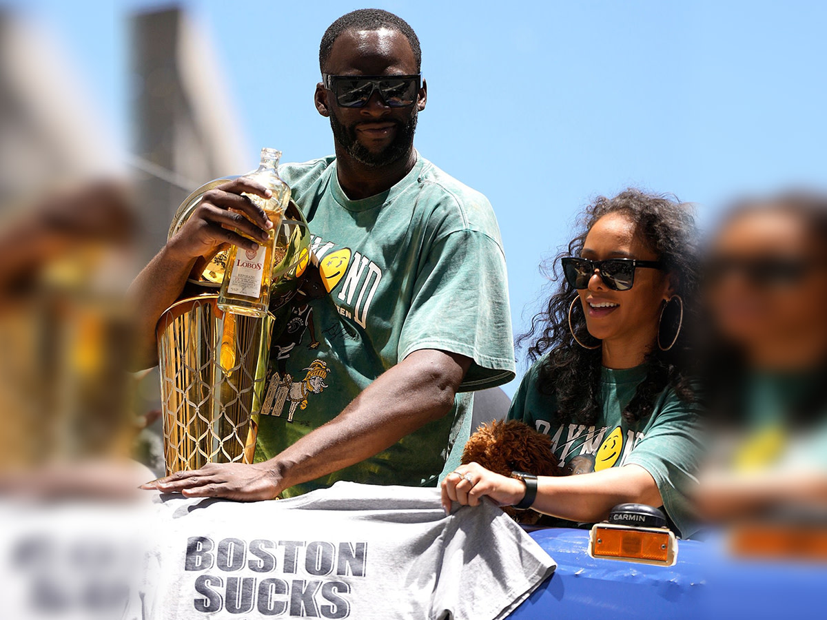 Draymond Green Was Spotted Holding A T-Shirt That Said "Boston Sucks" During The Warriors Championship Parade