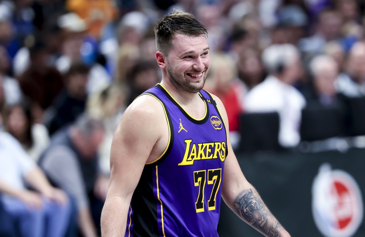 Los Angeles Lakers guard Luka Doncic (77) reacts against the Dallas Mavericks during the second half at American Airlines Center. Mandatory Credit: Kevin Jairaj-Imagn Images