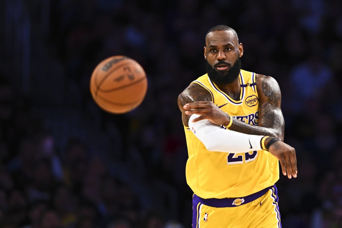 Los Angeles, California, USA; Los Angeles Lakers forward LeBron James (23) passes against the Houston Rockets during the first half at Crypto.com Arena. Mandatory Credit: Jonathan Hui-Imagn Images