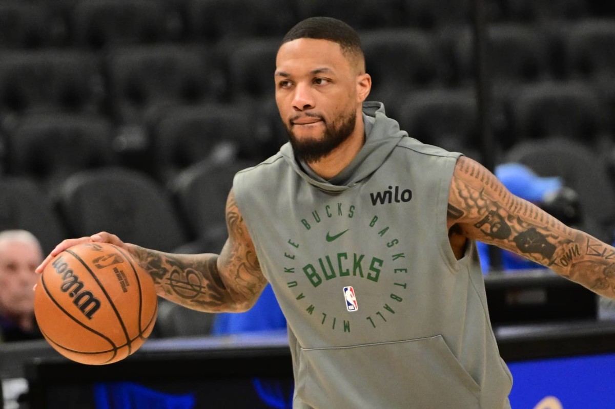 Milwaukee Bucks guard Damian Lillard (0) warms up before game against the Oklahoma City Thunder at Fiserv Forum.