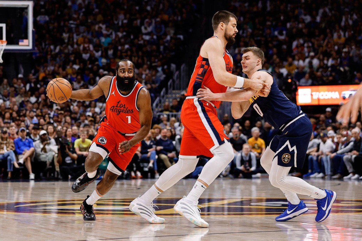 Apr 21, 2025; Denver, Colorado, USA; Los Angeles Clippers guard James Harden (1) controls the ball as center Ivica Zubac (40) screens against Denver Nuggets guard Christian Braun (0) in the first quarter during game two of first round for the 2025 NBA Playoffs at Ball Arena. Mandatory Credit: Isaiah J. Downing-Imagn Images