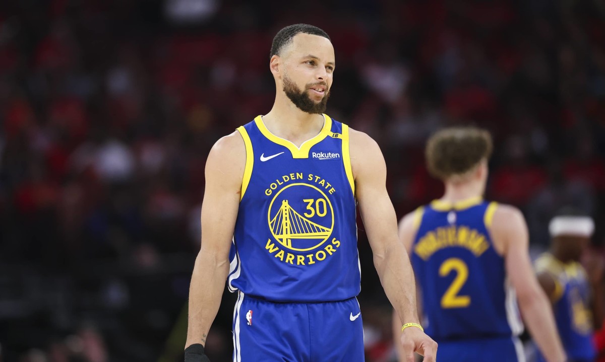 Golden State Warriors guard Stephen Curry (30) reacts during the third quarter against the Houston Rockets at Toyota Center.