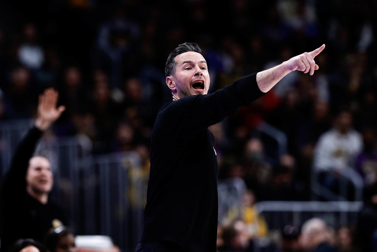 Los Angeles Lakers head coach JJ Redick gestures in the first quarter against the Denver Nuggets at Ball Arena.