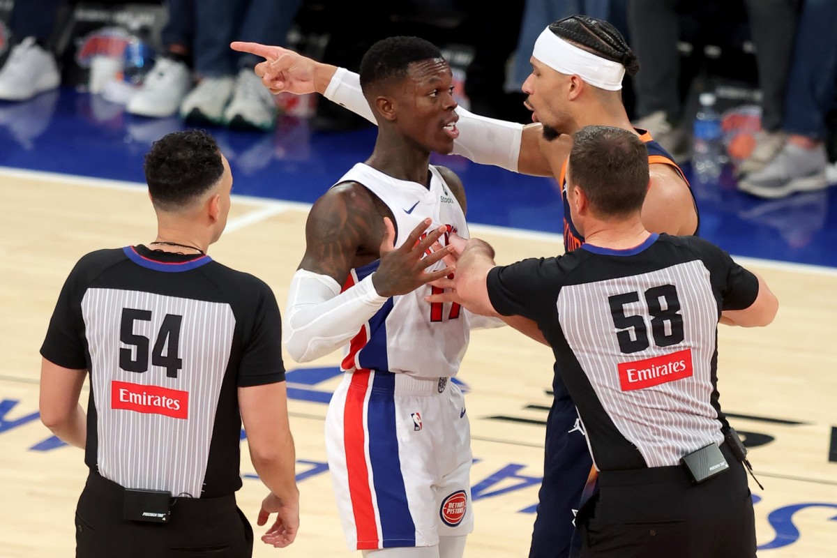 Detroit Pistons guard Dennis Schroder (17) and New York Knicks guard Josh Hart (3) are separated by referees Ray Acosta (54) and Josh Tiven (58) during the fourth quarter of game two of the first round of the 2024 NBA Playoffs at Madison Square Garden. Mandatory Credit: Brad Penner-Imagn Images