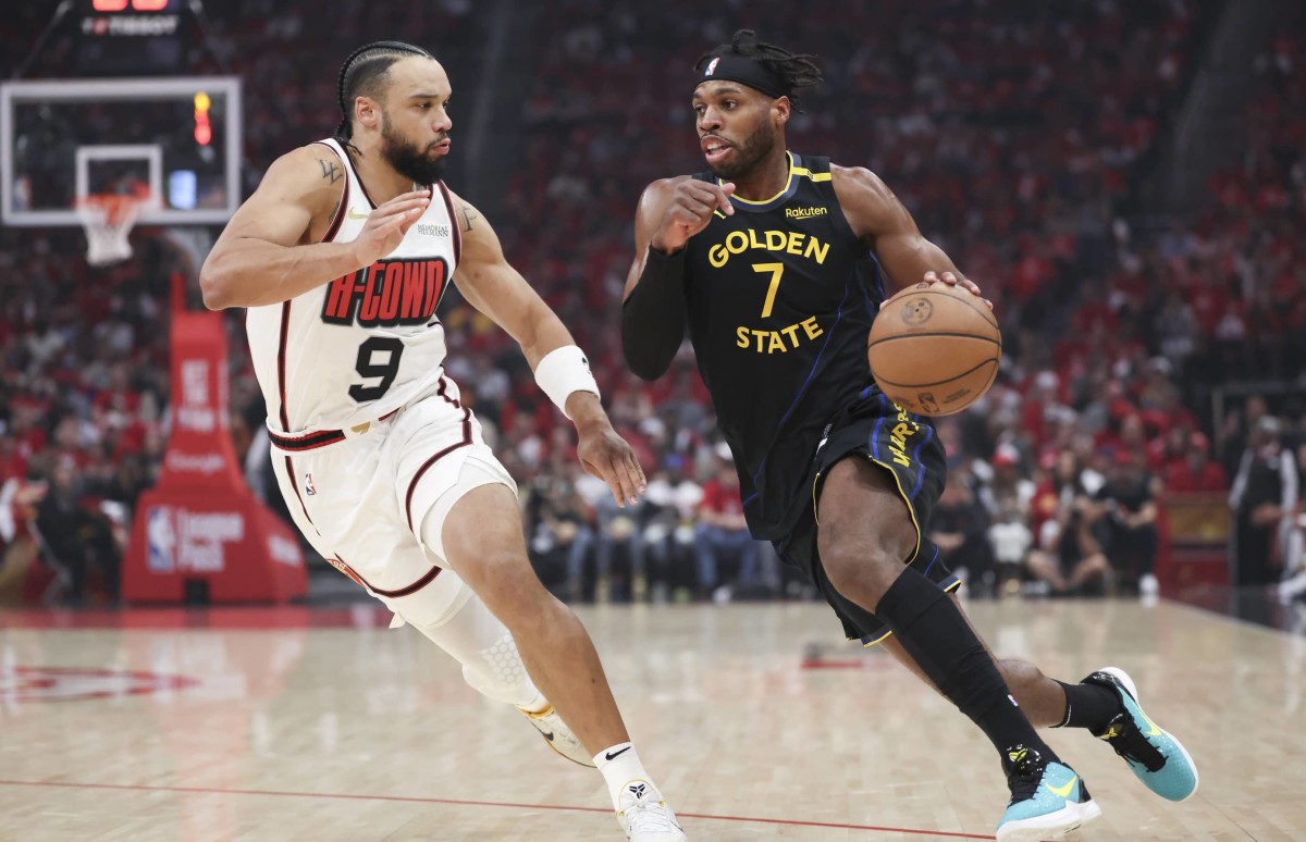 May 4, 2025; Houston, Texas, USA; Golden State Warriors guard Buddy Hield (7) dribbles the ball as Houston Rockets forward Dillon Brooks (9) defends during the first quarter of game seven of the first round for the 2025 NBA Playoffs at Toyota Center. 