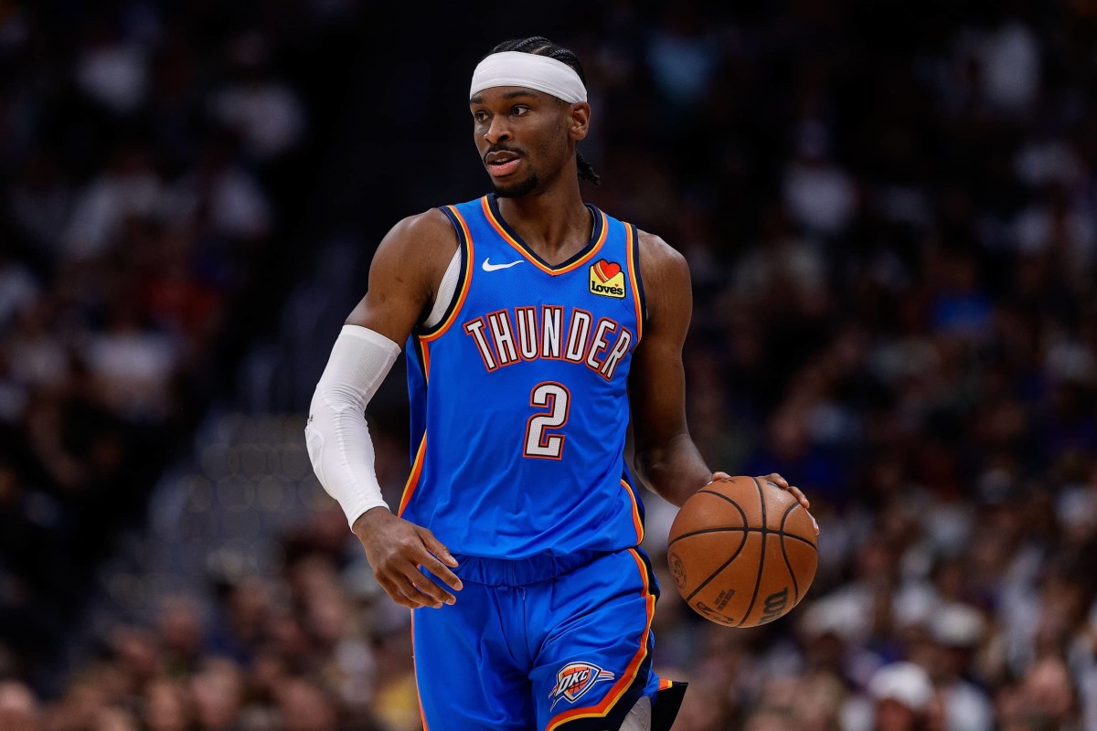 Oklahoma City Thunder guard Shai Gilgeous-Alexander (2) dribbles the ball up court in the second quarter against the Denver Nuggets during game six of the second round for the 2025 NBA Playoffs at Ball Arena.