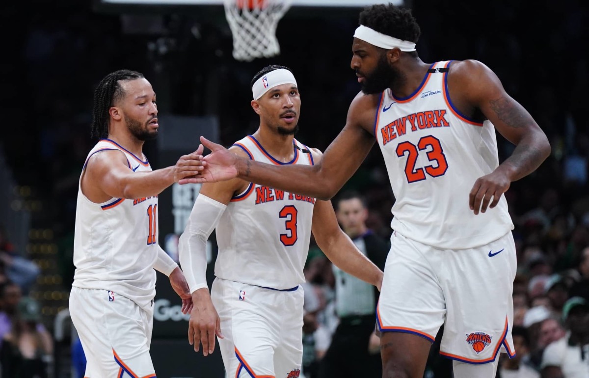 New York Knicks guard Jalen Brunson (11) and center Mitchell Robinson (23) react after a play against the Boston Celtics in the second half during game two of the second round for the 2025 NBA Playoffs at TD Garden.