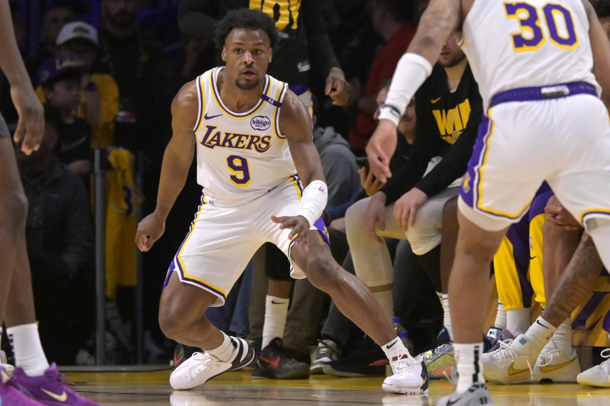 Los Angeles, California, USA; Los Angeles Lakers guard Bronny James (9) defends on the court in the second half against the Minnesota Timberwolves at Crypto.com Arena. Mandatory Credit: Jayne Kamin-Oncea-Imagn Images