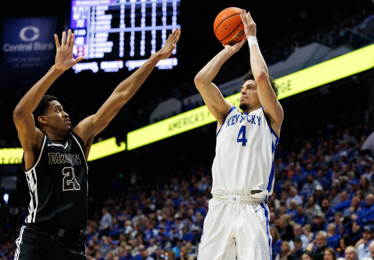 Dec 31, 2024; Lexington, Kentucky, USA; Kentucky Wildcats guard Koby Brea (4) shoots the ball during the second half against the Brown Bears at Rupp Arena at Central Bank Center. Mandatory Credit: Jordan Prather-Imagn Images