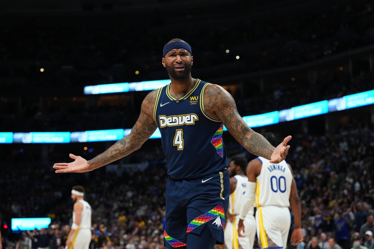Apr 24, 2022; Denver, Colorado, USA; Denver Nuggets center DeMarcus Cousins (4) reacts to a foul in the second quarter against the Golden State Warriors of the first round for the 2022 NBA playoffs at Ball Arena. Mandatory Credit: Ron Chenoy-Imagn Images