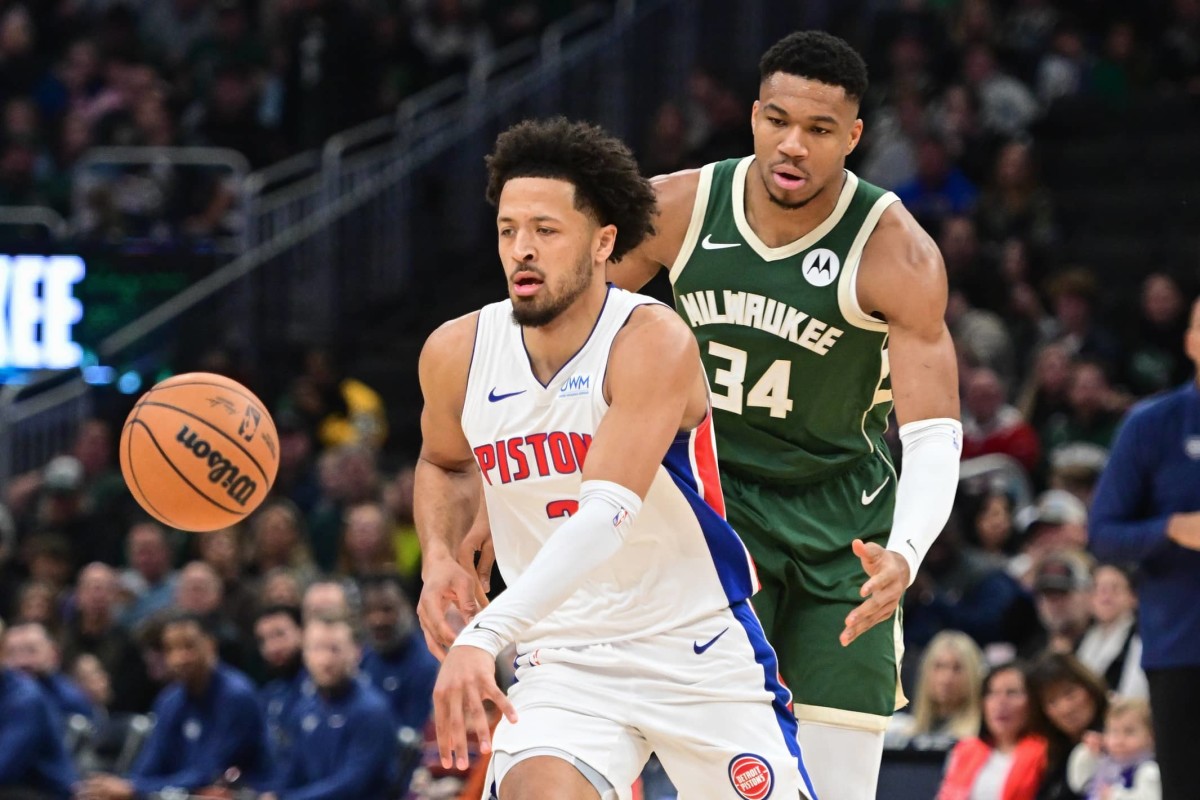 Detroit Pistons guard Cade Cunningham (2) is guarded by Milwaukee Bucks forward Giannis Antetokounmpo (34) in the first quarter at Fiserv Forum.