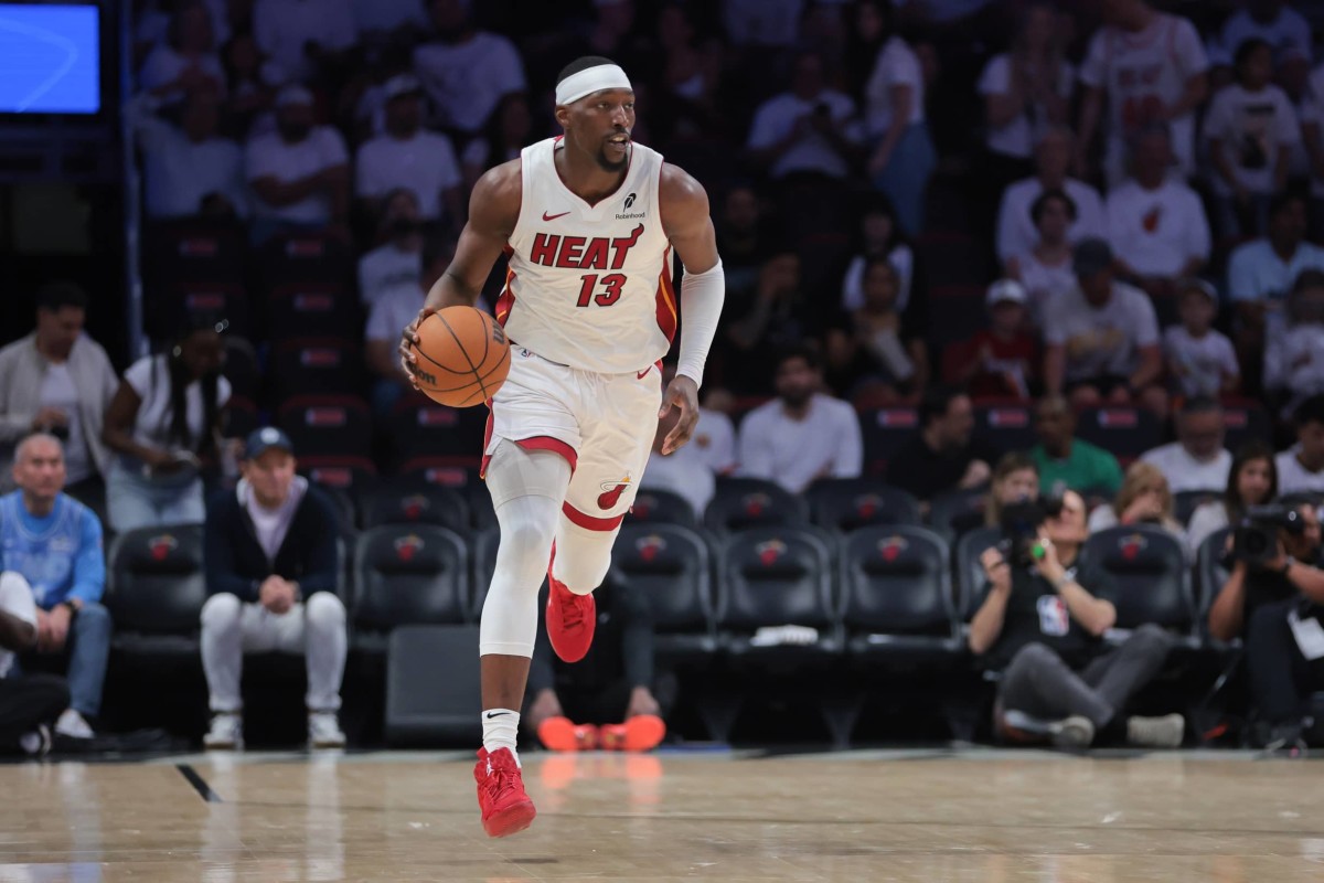 Apr 26, 2025; Miami, Florida, USA; Miami Heat center Bam Adebayo (13) dribbles the basketball against the Cleveland Cavaliers in the third quarter during game three for the first round of the 2025 NBA Playoffs at Kaseya Center.