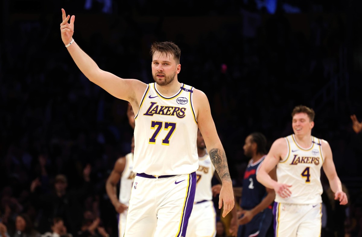 Mar 2, 2025; Los Angeles, California, USA; Los Angeles Lakers guard Luka Doncic (77) reacts to a play during the third quarter against the LA Clippers at Crypto.com Arena. Mandatory Credit: Jason Parkhurst-Imagn Images