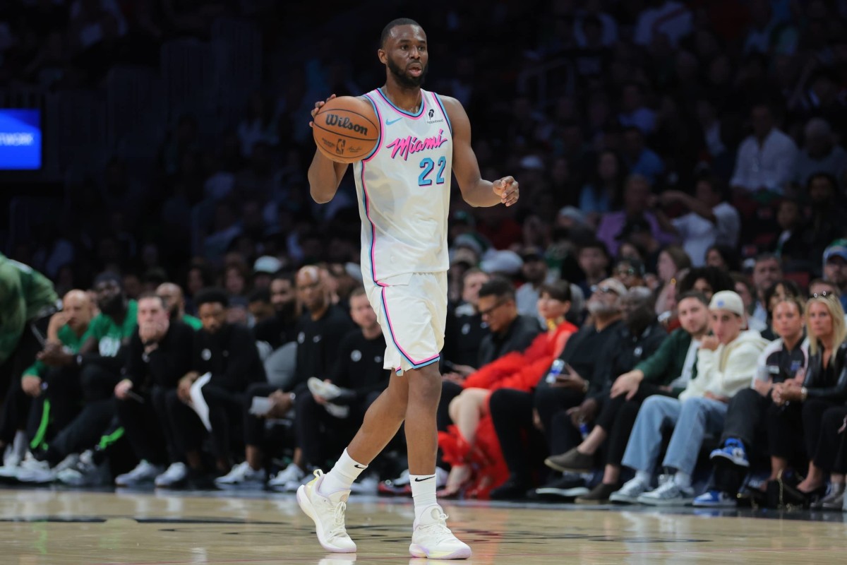 Miami Heat forward Andrew Wiggins (22) dribbles the basketball against the Boston Celtics during the second quarter at Kaseya Center.