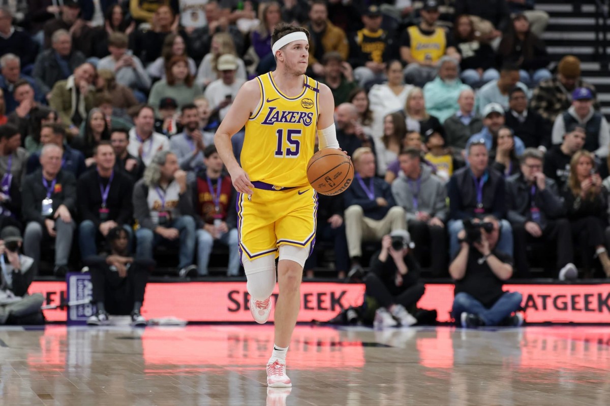 Feb 12, 2025; Salt Lake City, Utah, USA; Los Angeles Lakers guard Austin Reaves (15) dribbles against the Utah Jazz during the first quarter at Delta Center. Mandatory Credit: Chris Nicoll-Imagn Images